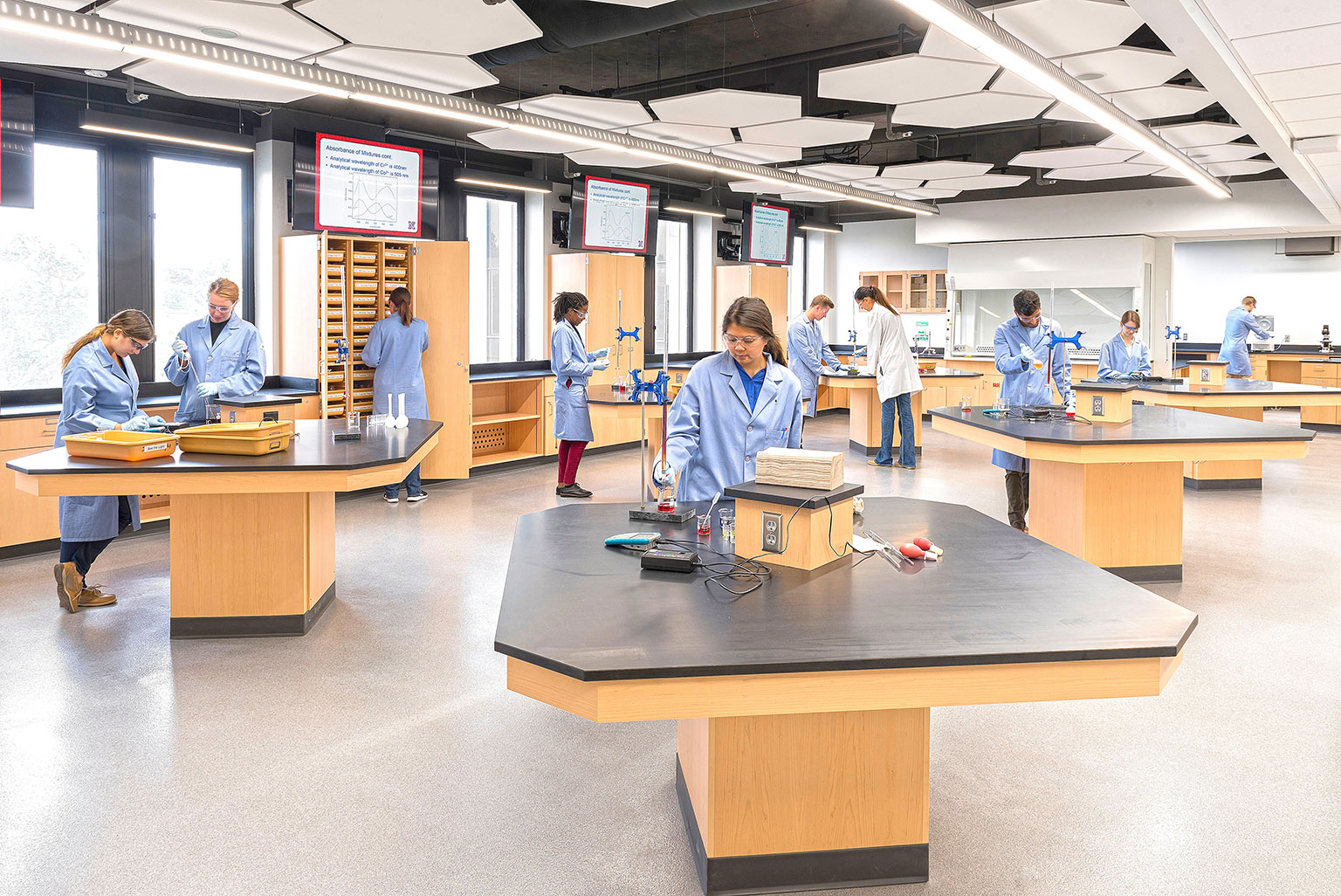 1. Students work in open lab space with clear walkways between diamond shaped workstations