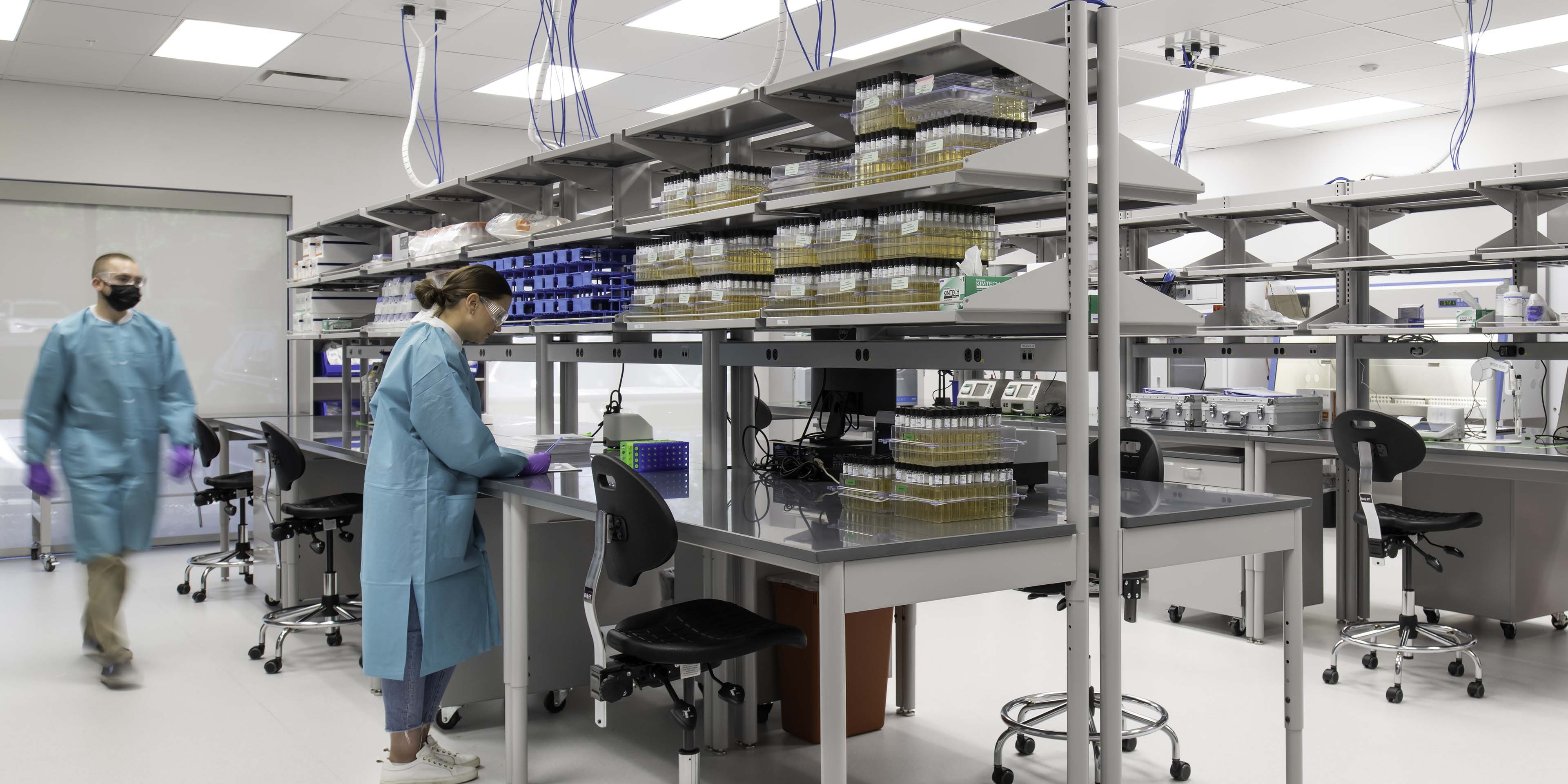 scientists inside a cellular therapy lab
