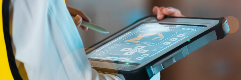 person on tablet controlling automation system
