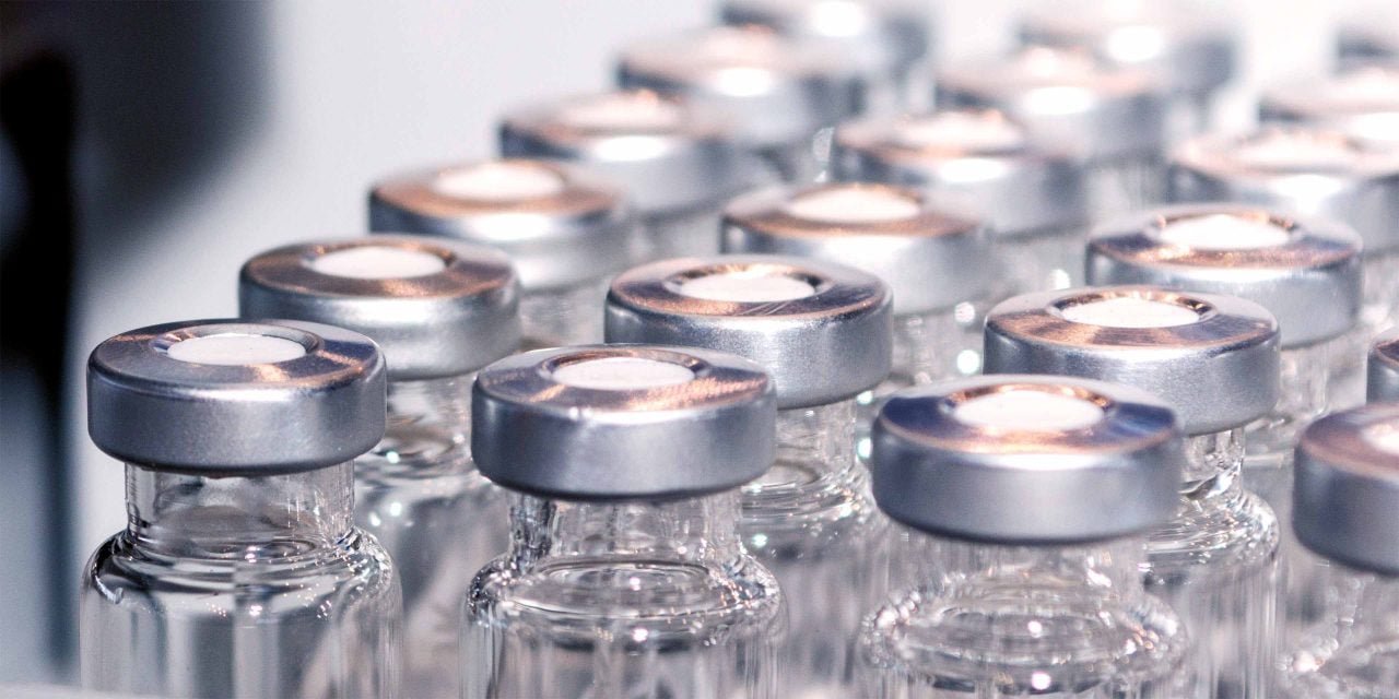 flu vaccine vials in a manufacturing facility
