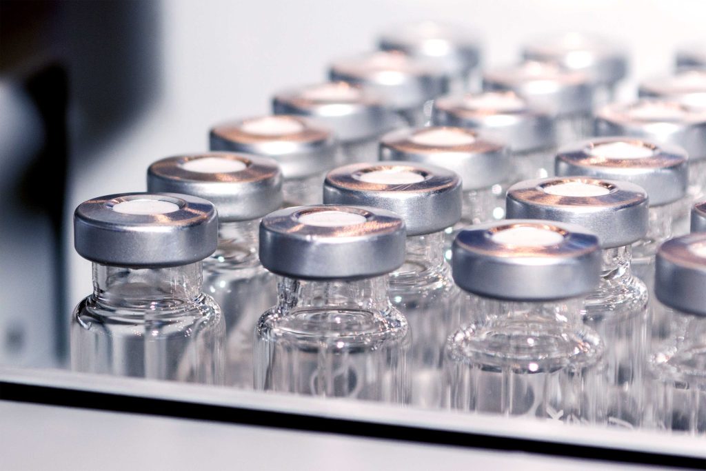 flu vaccine vials in a manufacturing facility