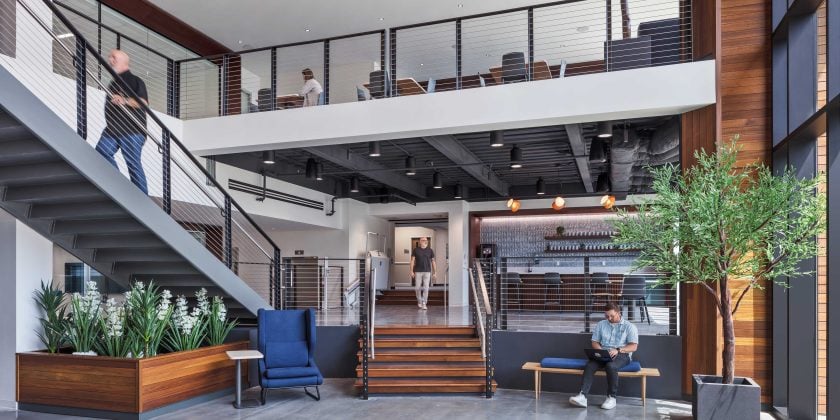 New, high-end R&D lobby design with natural elements and wood finishes
