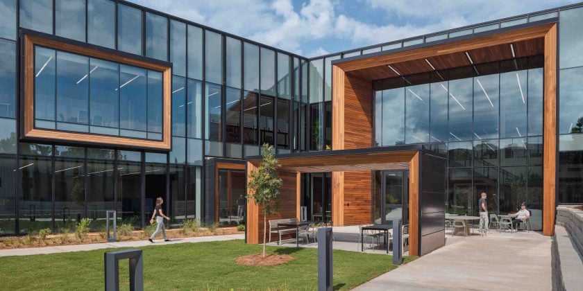 Views of modern R&D building architecture with natural wood finishes and large windows